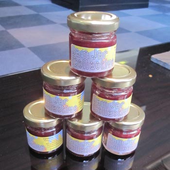 A pyramid of Jam Jar business jars